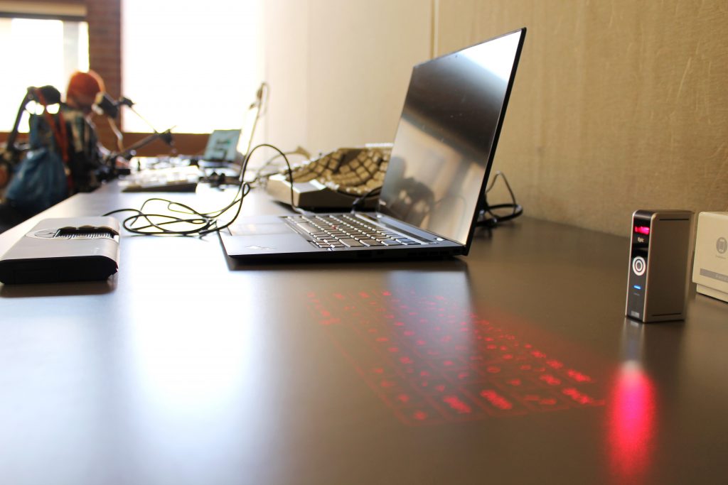 Banner image for screen reader blog post displays an open laptop with assistive technology