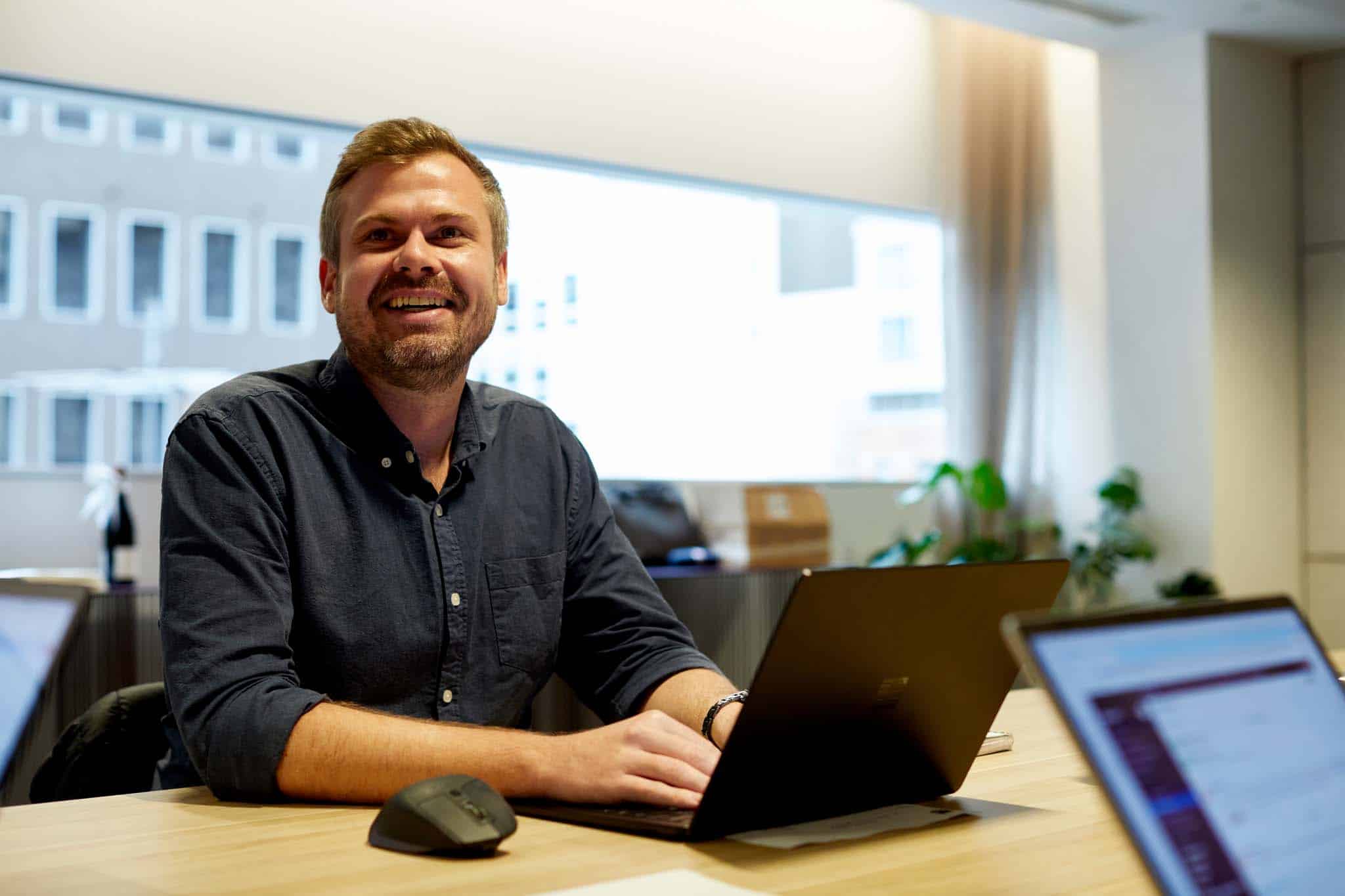 Man attending an online meeting