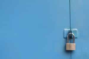 Blue cupboard with padlock to represent security