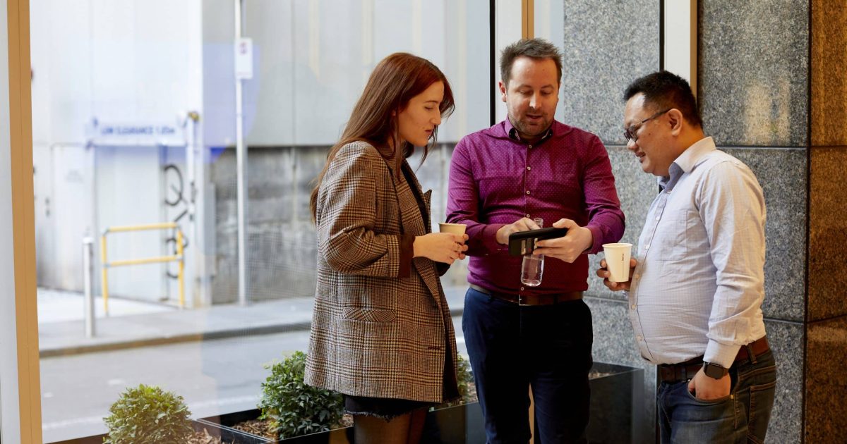 Group of employees engaging with SharePoint Online