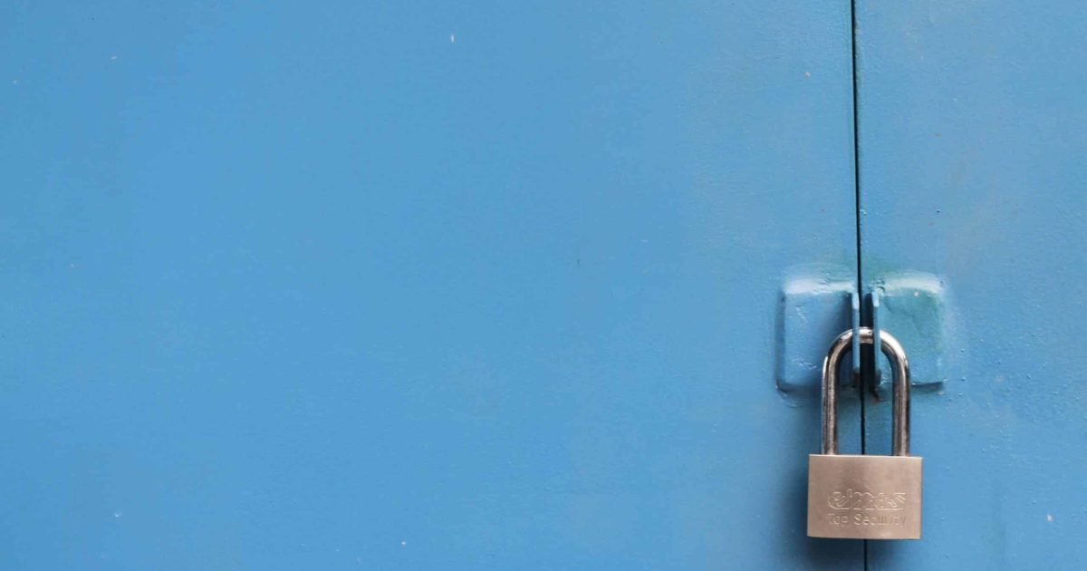 Blue cupboard with padlock to represent security
